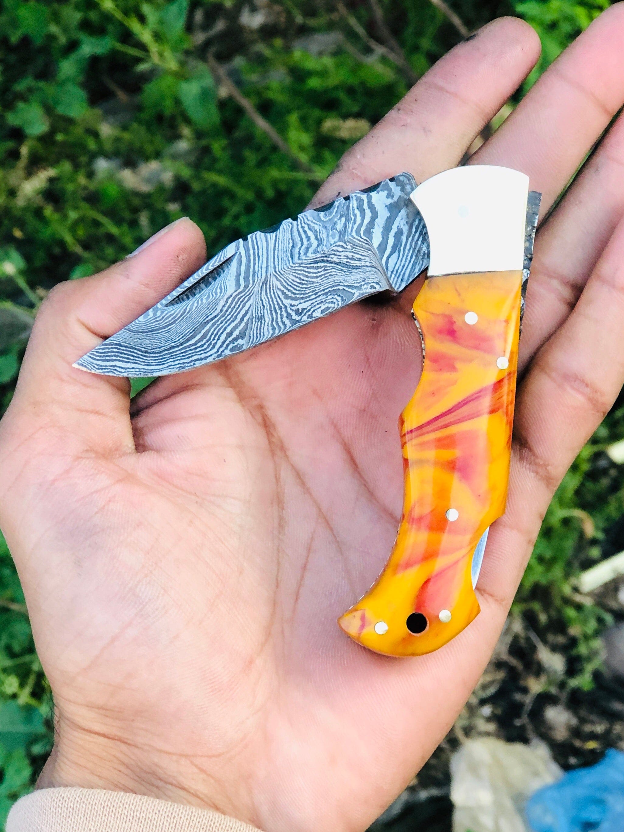 KBS Knives Store Folding Knives Custom Handmade Damascus Steel Top Best Folding Pocket Knife with Epoxy Resin Handle and Leather Case by KBS Knives Store.