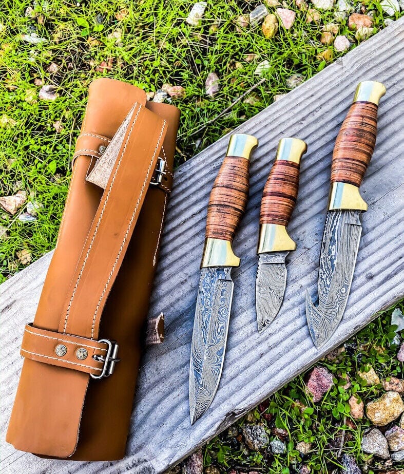 KBS Knives Store Hunting Knife Wilderness Trio: 3-Piece Hunting Knives Set with Damascus Steel Blades, Stacked Leather Handles, Brass Guards, and Leather Roll