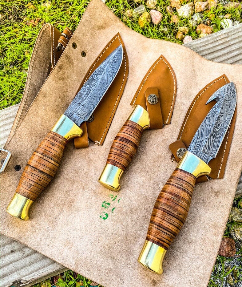 KBS Knives Store Hunting Knife Wilderness Trio: 3-Piece Hunting Knives Set with Damascus Steel Blades, Stacked Leather Handles, Brass Guards, and Leather Roll