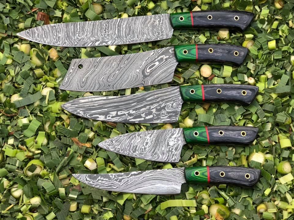 KBS Knives Store Kitchen Knives Set 5-piece kitchen knives set with Twist Damascus steel blades and handles made from Exotic Color Wood. Perfectly stored in a leather roll for culinary excellence.